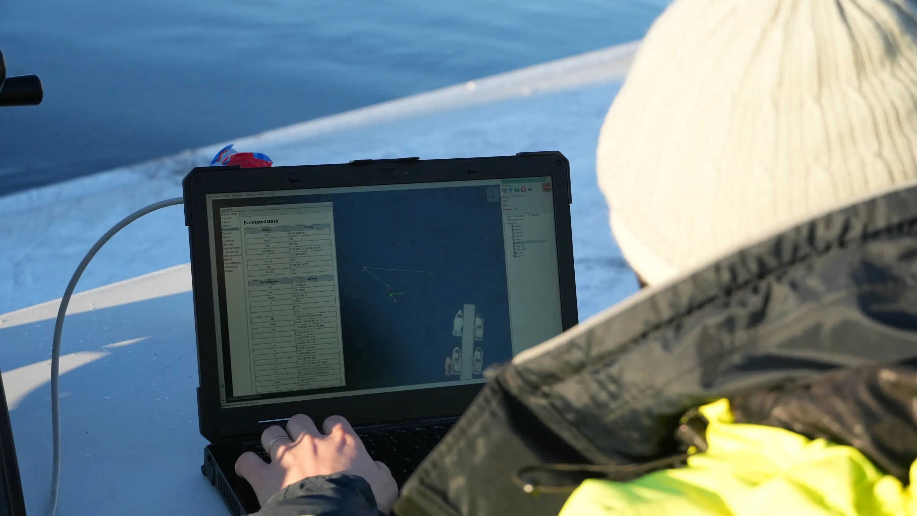 An operator following a CORAX mission in the Skarv software from the boat