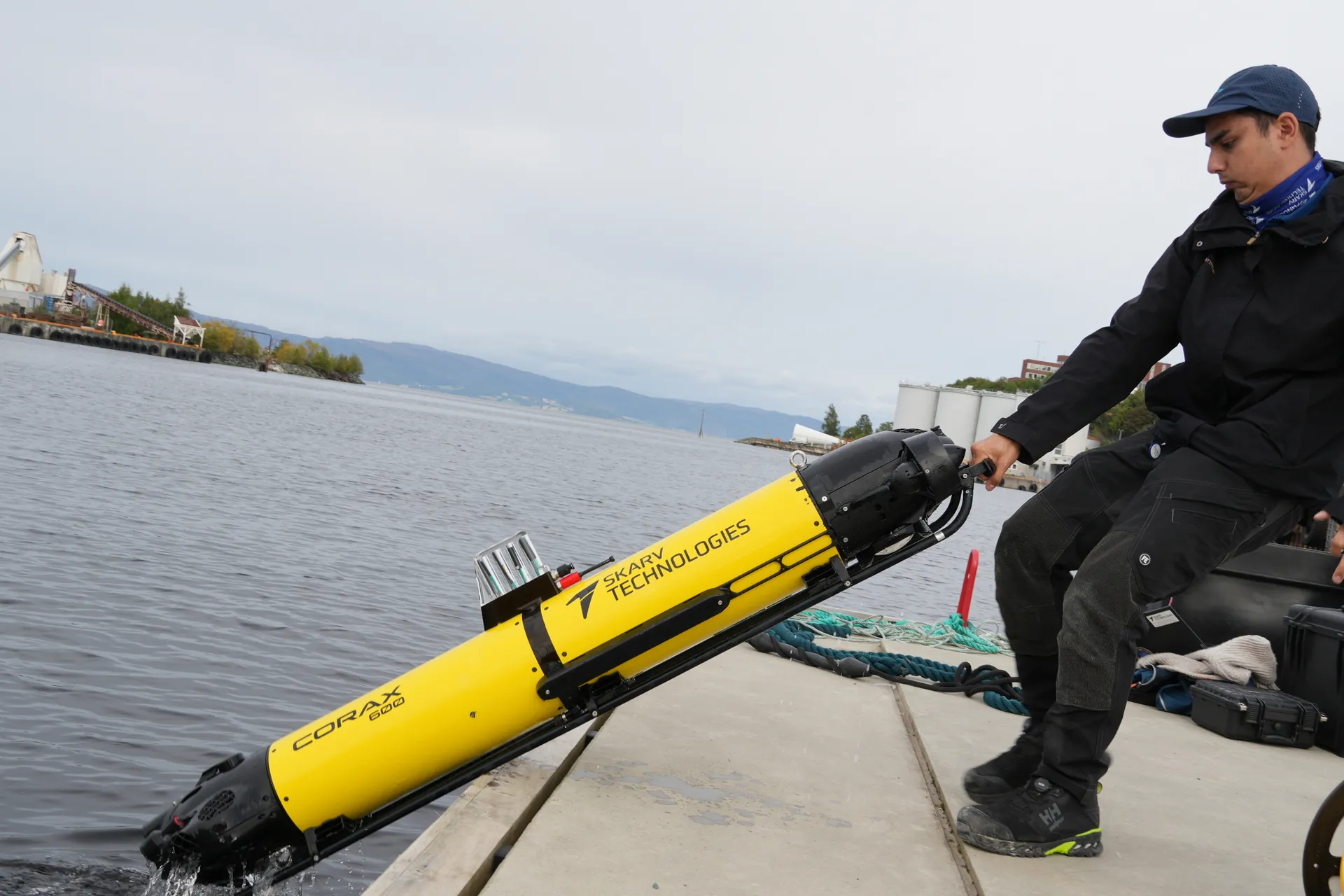 CORAX 600 being recovered onto the quay by hand